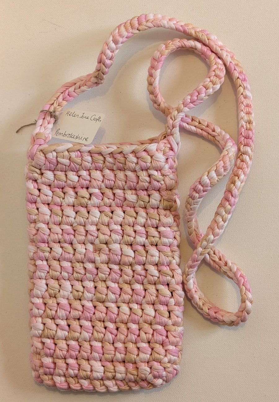 Handmade crochet crossbody bag made with multicoloured pink t-shirt yarn 