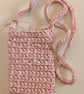 Handmade crochet crossbody bag made with multicoloured pink t-shirt yarn 