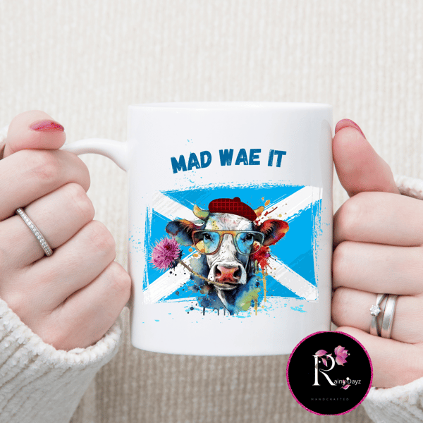 Humorous Scottish mug with cow