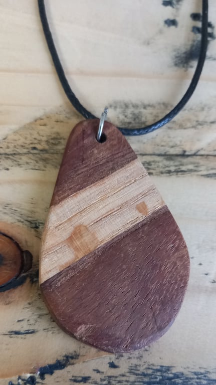Handmade wooden pendant is crafted from reclaimed oak & walnut