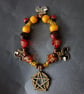 Elasticated nature-inspired beaded charm bracelet with pentacle - Image 3