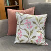 Spring blossom embroidered linen cushion cover
