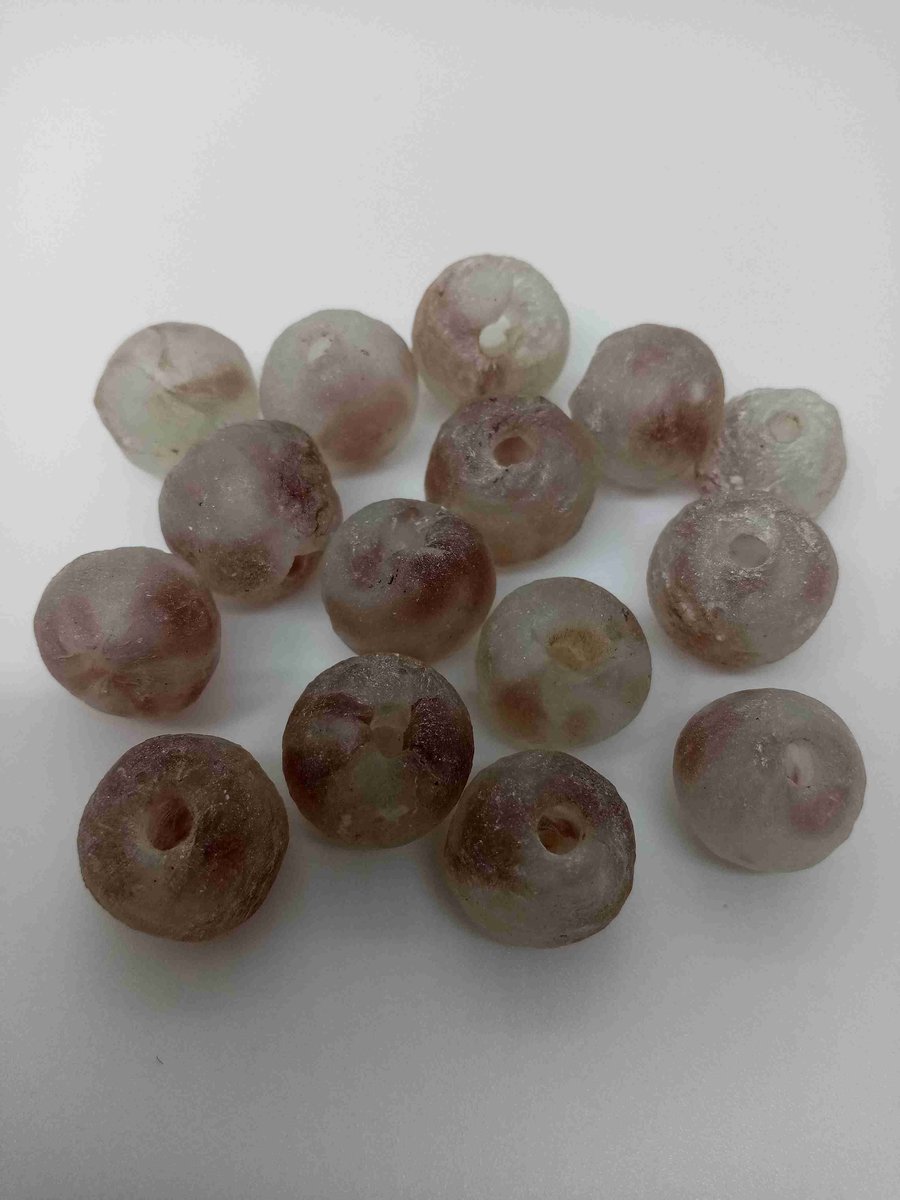 15 African round beads of recycled glass 13 - 15 mm, clear mottled with brown