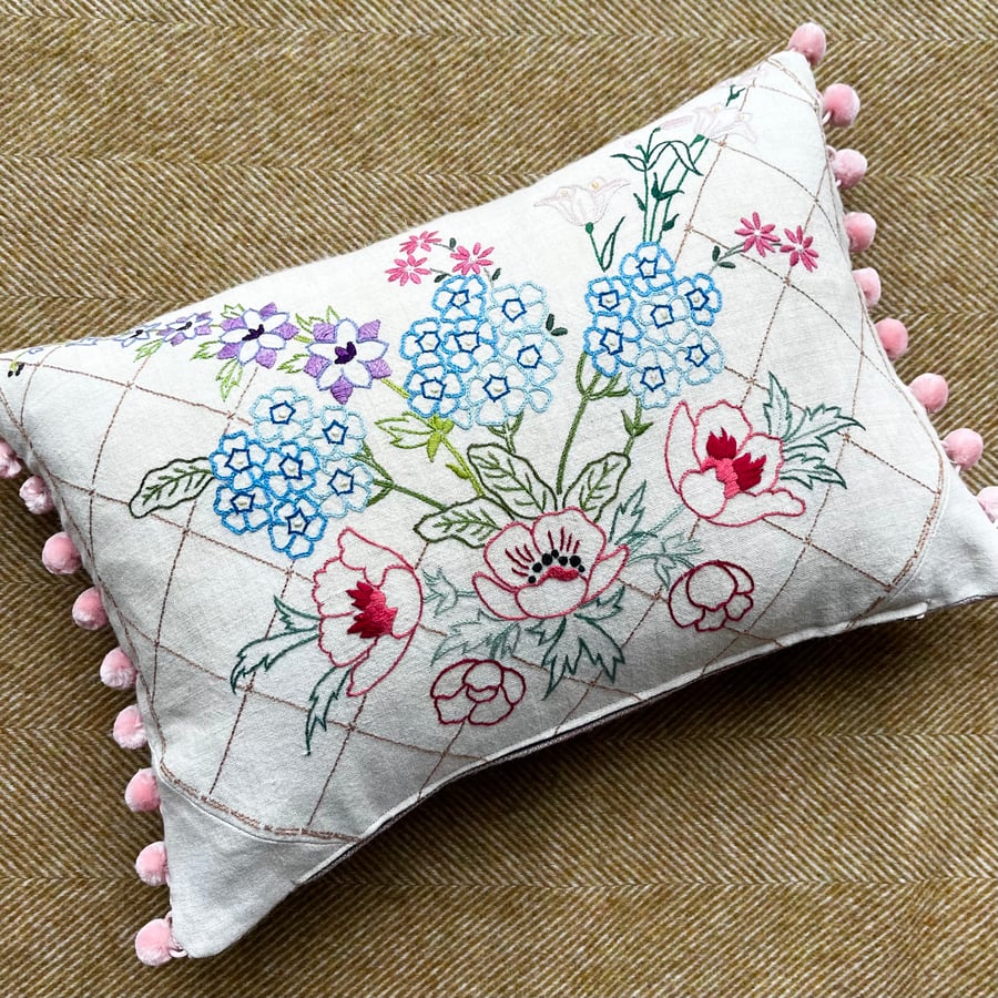Reclaimed floral embroidery cushion with pompoms country cottage style