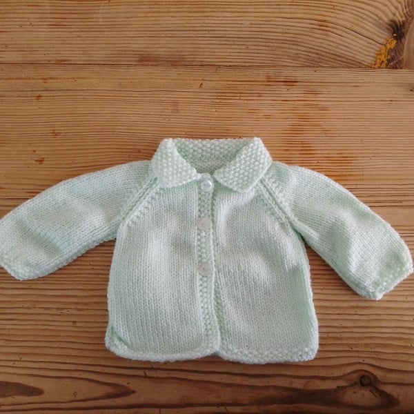 Hand knitted mint baby cardigan with collar for age 0-3 months.