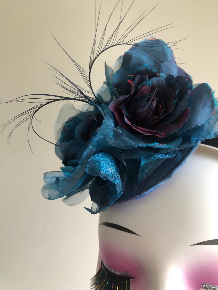 Two tone dark blue with a hint of red fascinator headband or crocodile clip.