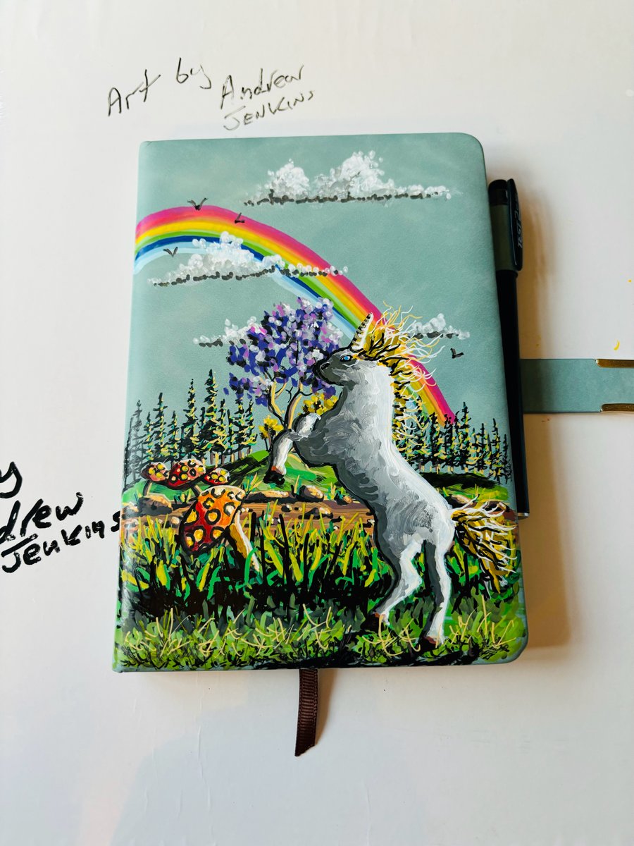 A hand painted and sealed faux leather journal by Andrew Jenkins 