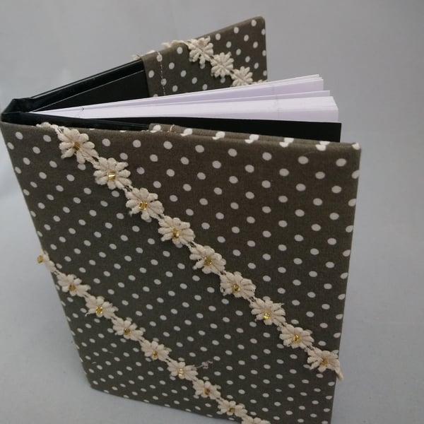 Note Book covered in fabric with cotton lace flowers with beads