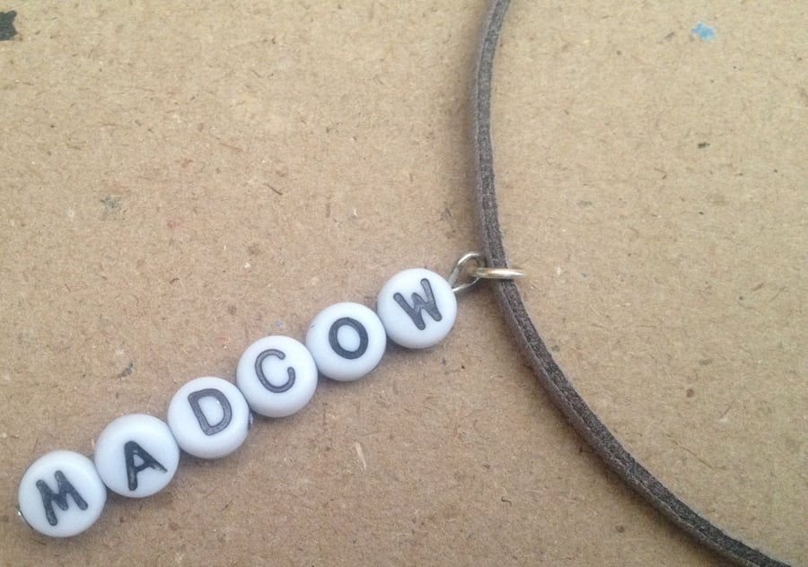 Letter pendant: mad cow