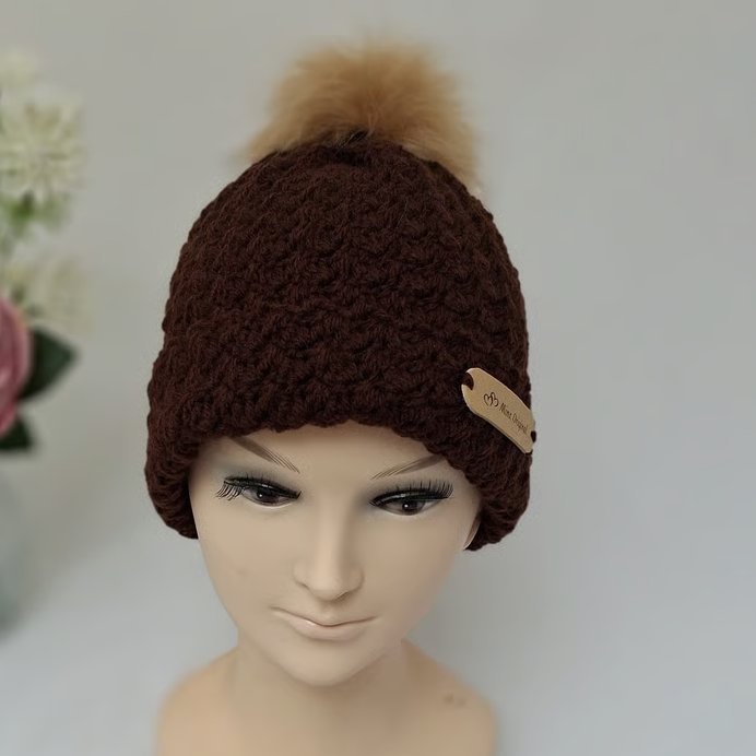 Handmade crochet hat with fur bobble