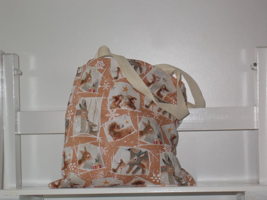 Mini Christmas present bag printed with baby deer, donkey and rabbits 