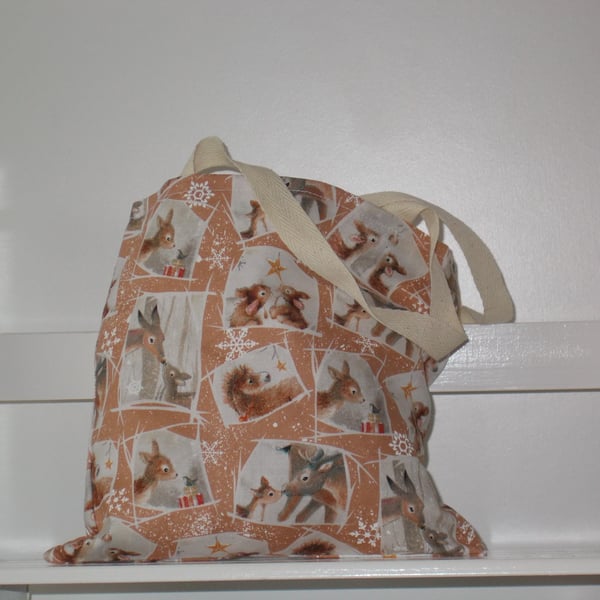 Mini Christmas present bag printed with baby deer, donkey and rabbits 