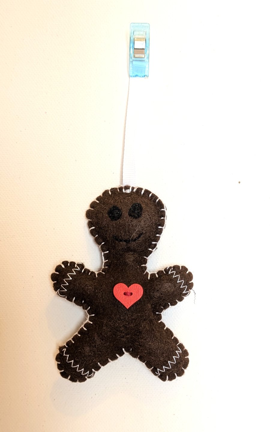 Handmade sewn felt Christmas tree decoration gingerbread man