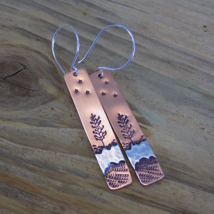 Copper and silver 'tree and star' earrings 