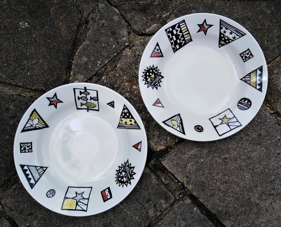 Pasta or soup dishes - a pair in white china hand decorated with abstract panels