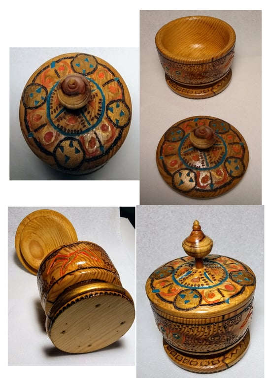 Storage ornament with a yew finial and  animal shapes and patterns