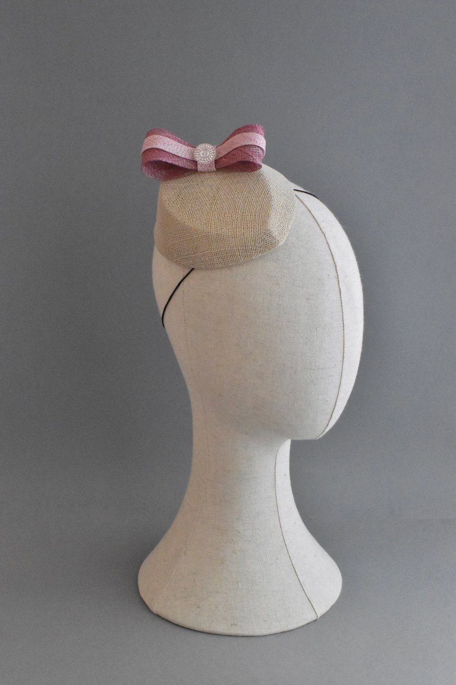 Ivory Pillbox Hat with a Pink Bow and a Vintage Button