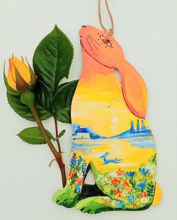sitting hare hand painted with lake and flowers