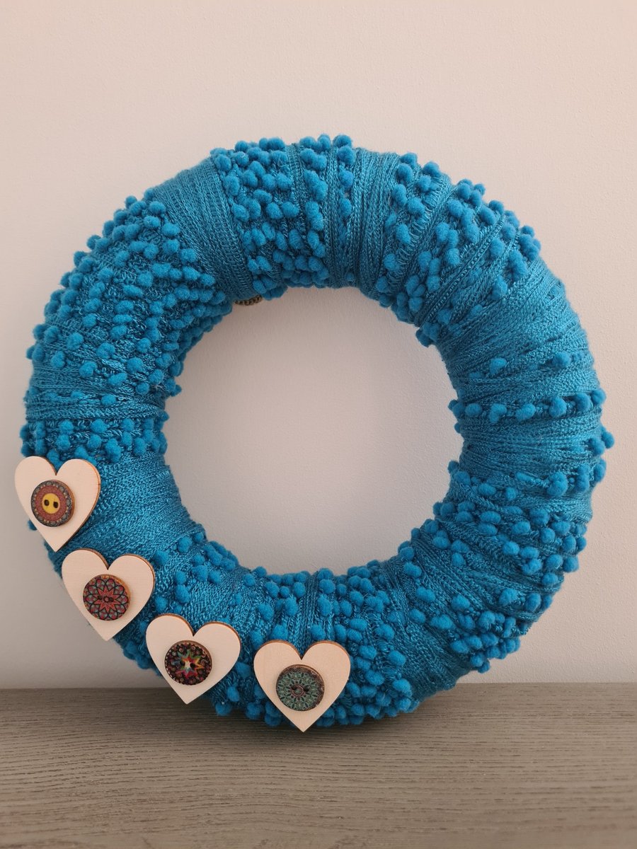 Handmade Bobbly Blue Yarn Wrapped Wreath With Wooden Heart Accents, Home Decor