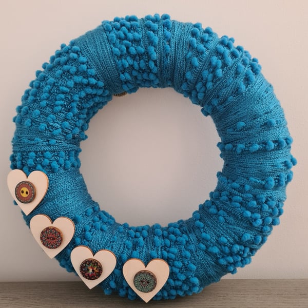 Handmade Bobbly Blue Yarn Wrapped Wreath With Wooden Heart Accents, Home Decor