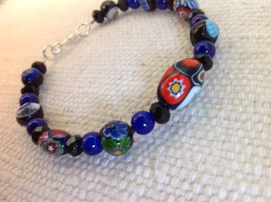 Elegant blue bead bracelet of vintage millefiori and French jet beads