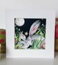 Mounted Resting Rabbit with baby under the Moon and Stars Watercolour Print