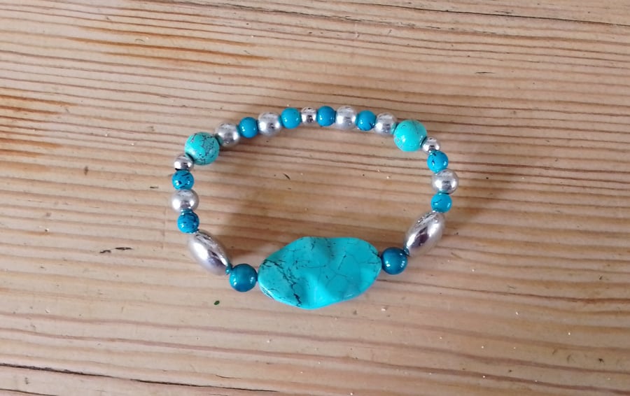 Handmade bracelet made using pre-loved beads.