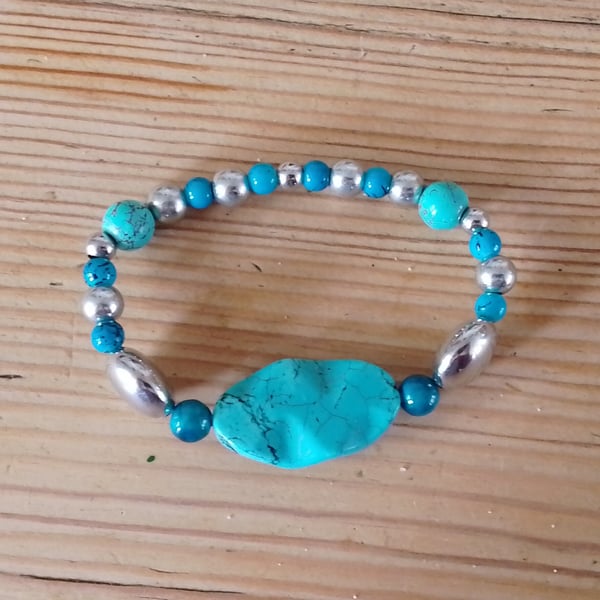 Handmade bracelet made using pre-loved beads.