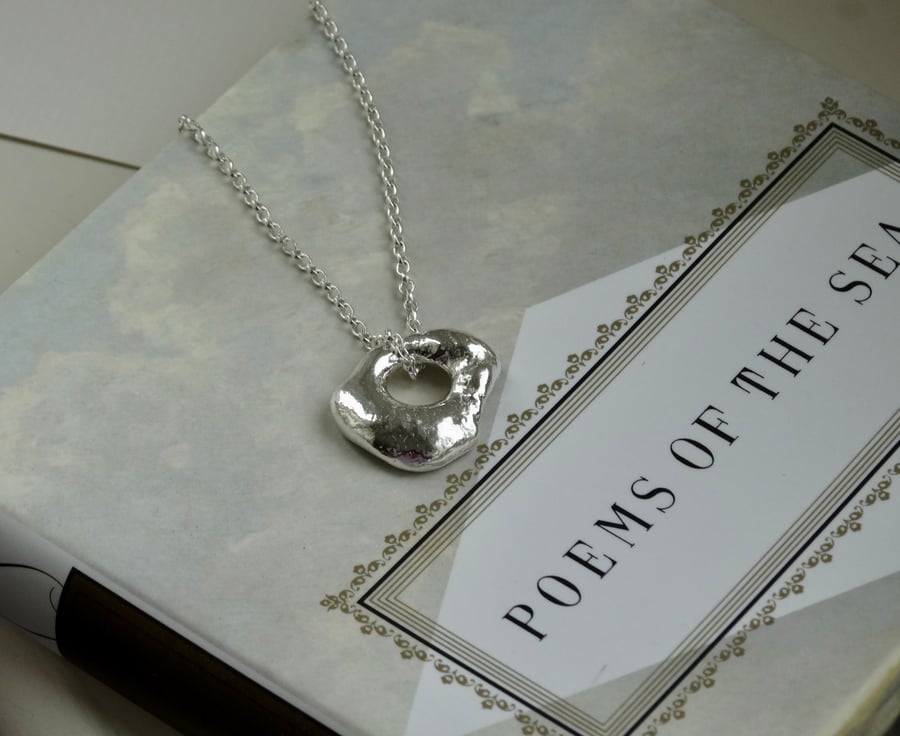 Silver hag stone pendant - molten silver nugget - silver charm amulet OOAK