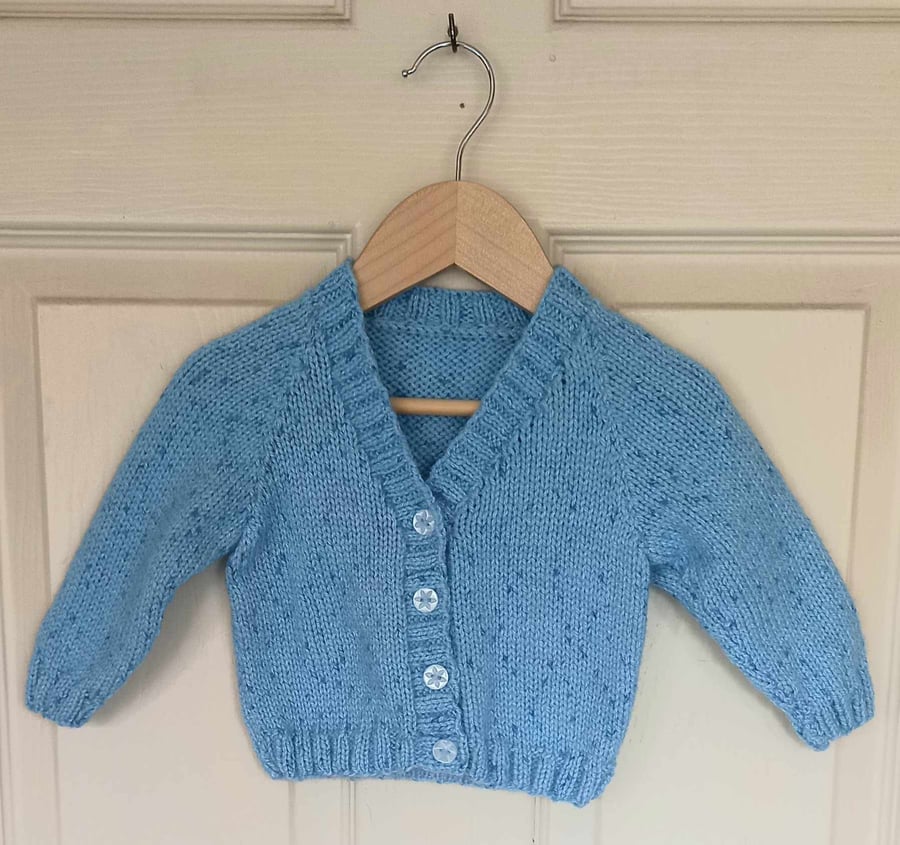Hand knitted baby cardigan blue spot dk 6-12 months