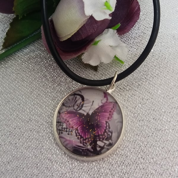 Purple butterfly on cord necklace