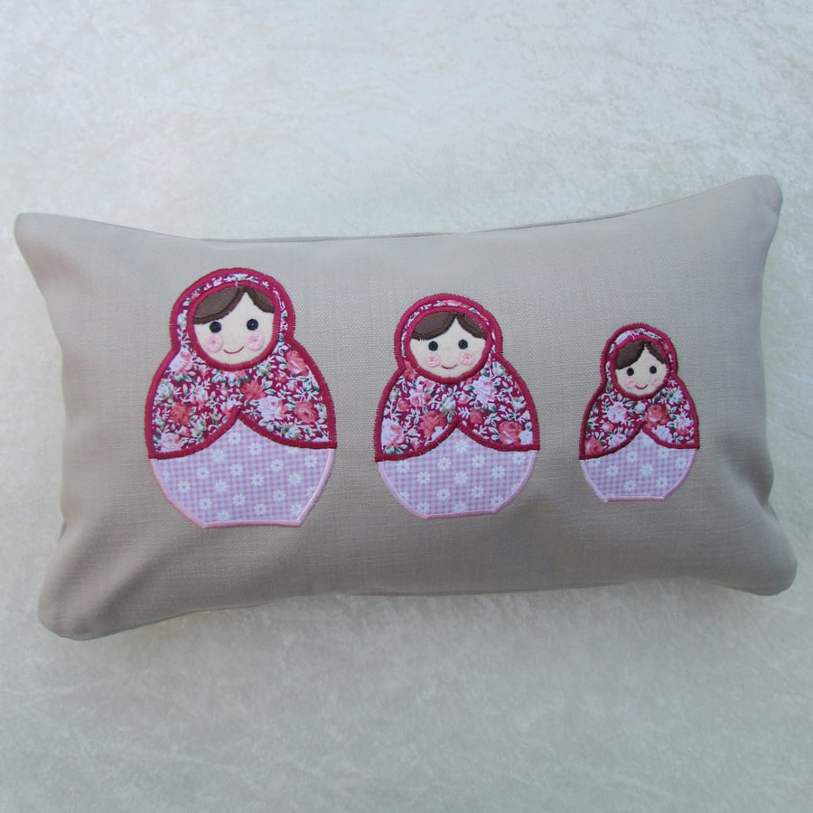 Russian dolls appliqued rectangular cushion