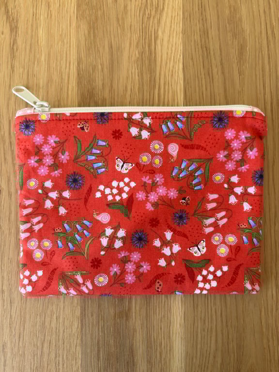 Zipped fabric pouch, purse, make up bag, in a red floral print