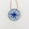 Round enamel and copper pendant