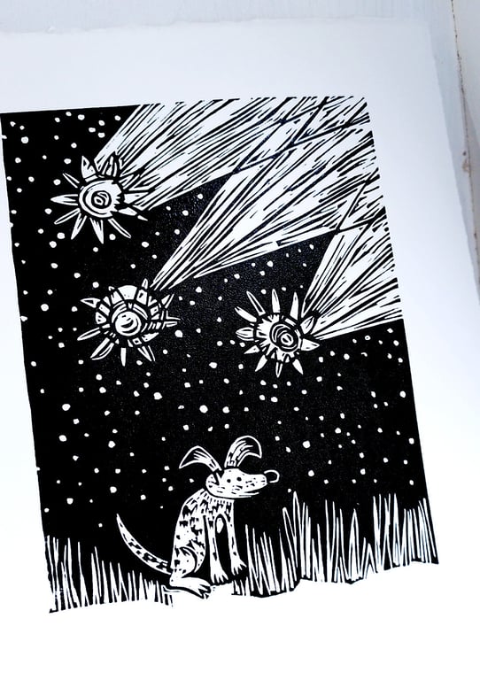 Dog, oblivious to Comets - lino cut print