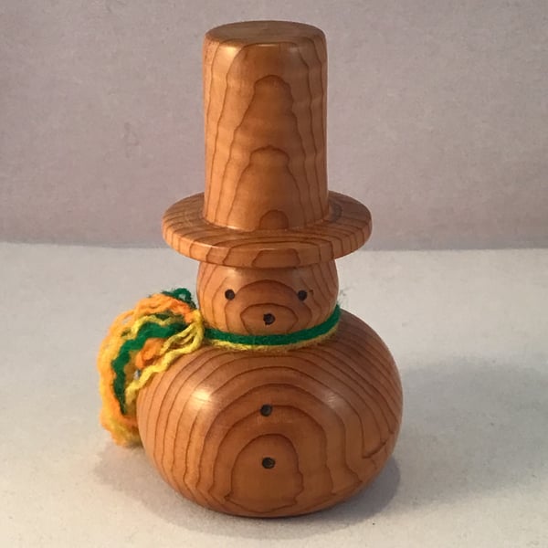 Natural wood snowman.