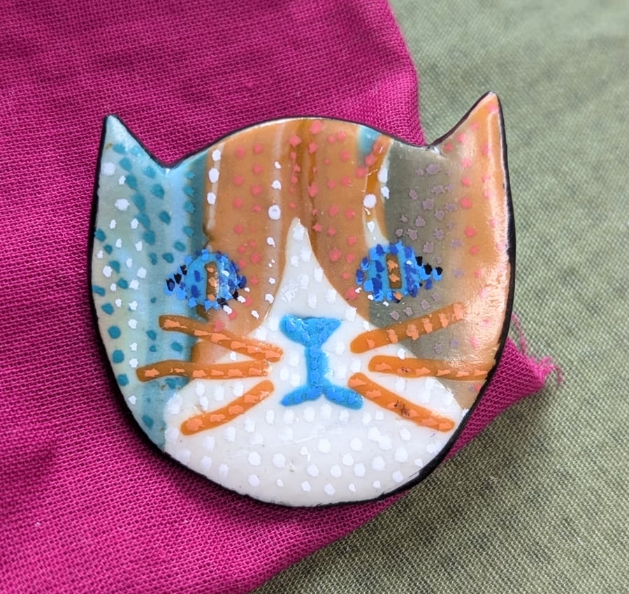 Orange and blue polymer clay cat brooch
