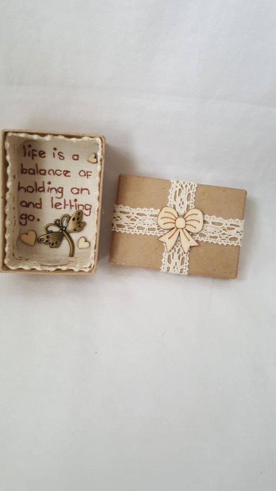 small miniature art diorama with a message 'life is a balance...................