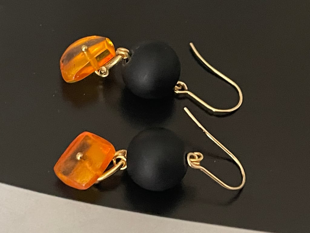 Artisan handmade Baltic honey colour amber and black glass dangling earrings