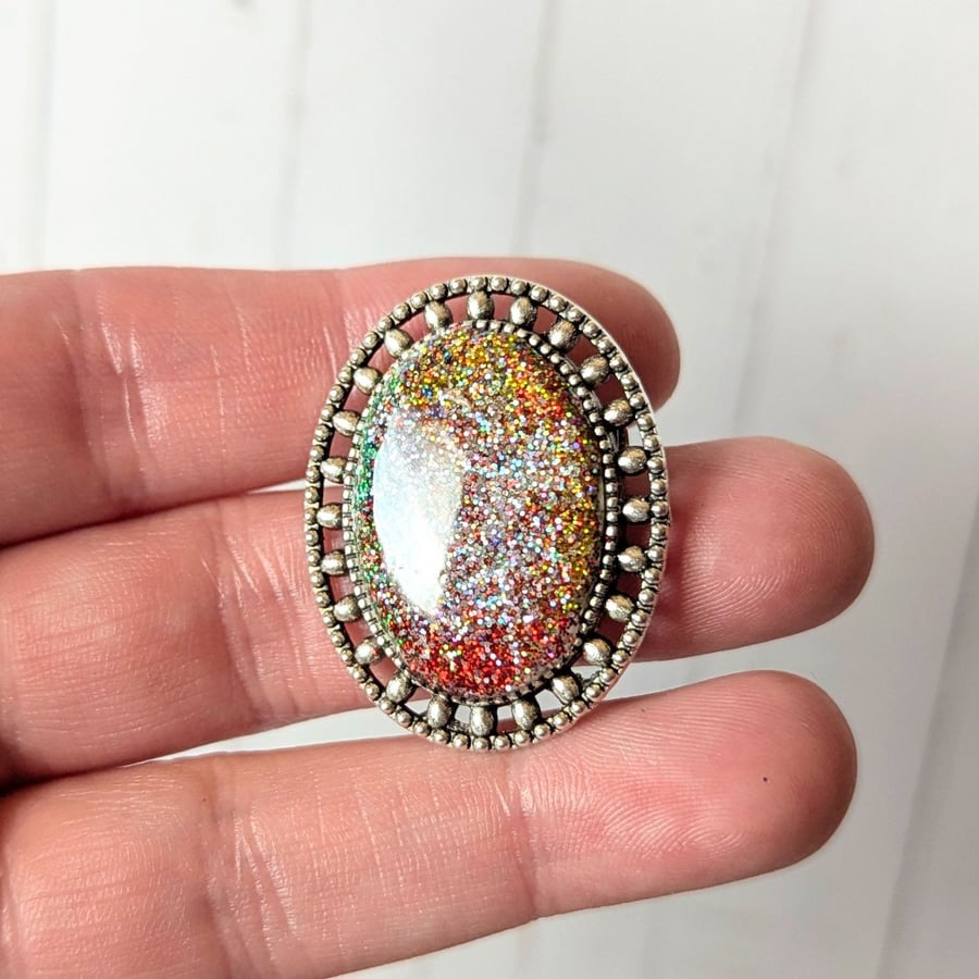 Oval beaded alloy firestone brooch