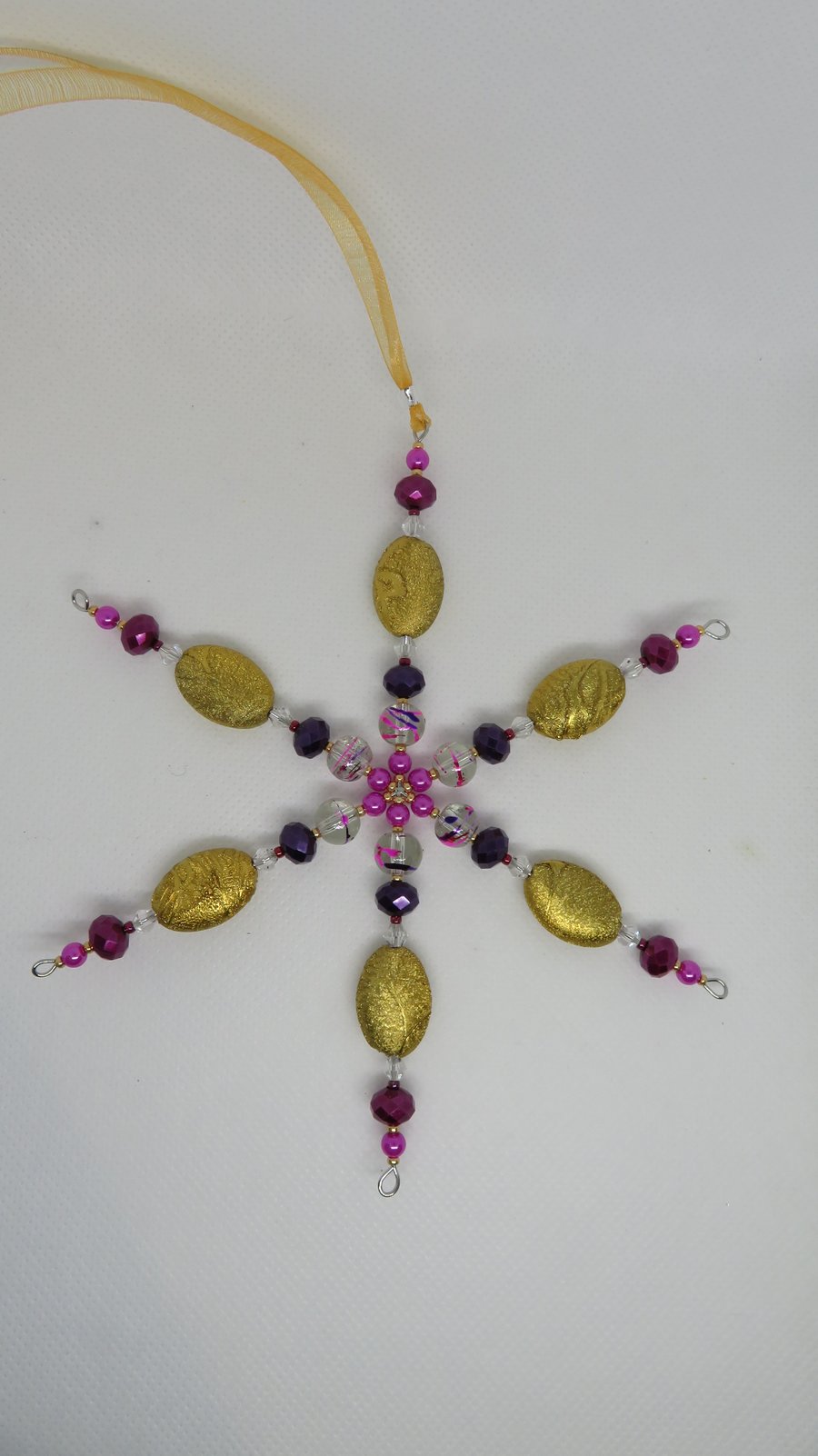 Large gold and purple snowflake