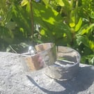 Sterling silver flat hammered hoop earrings 