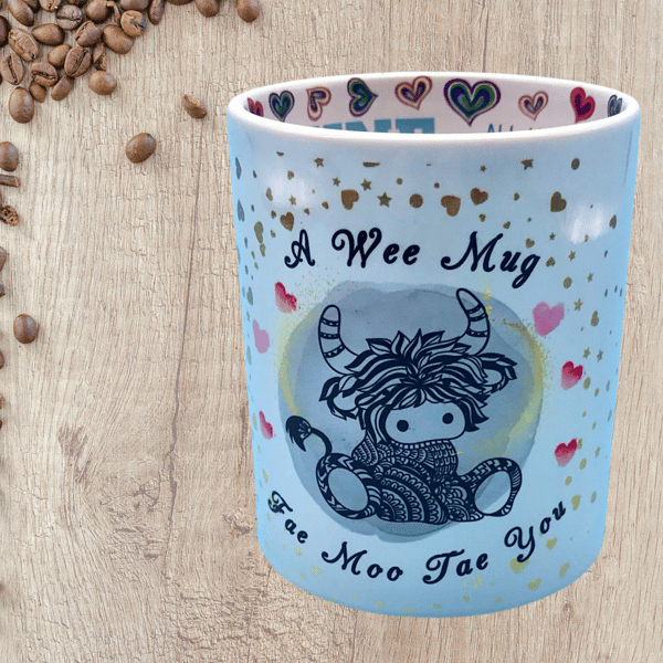 Hug mug with Scottish Coo print and love messages  inside and down the handle