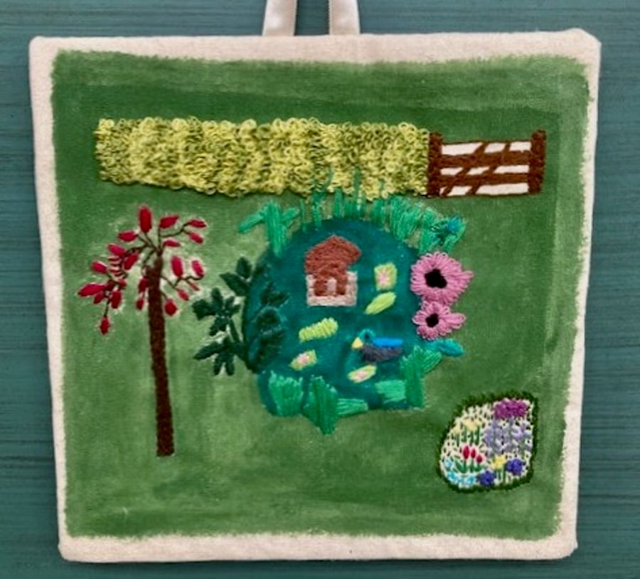 Duck pond embroidered picture.