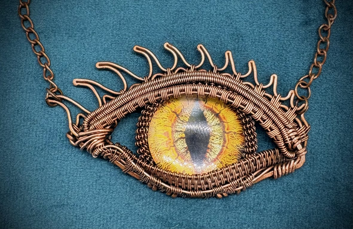 Antique copper wire wrapped Dragon's Eye pendant