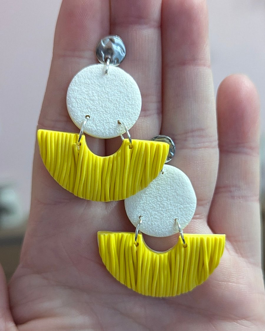 Sprinkles button half circle drop earrings in yellow. 