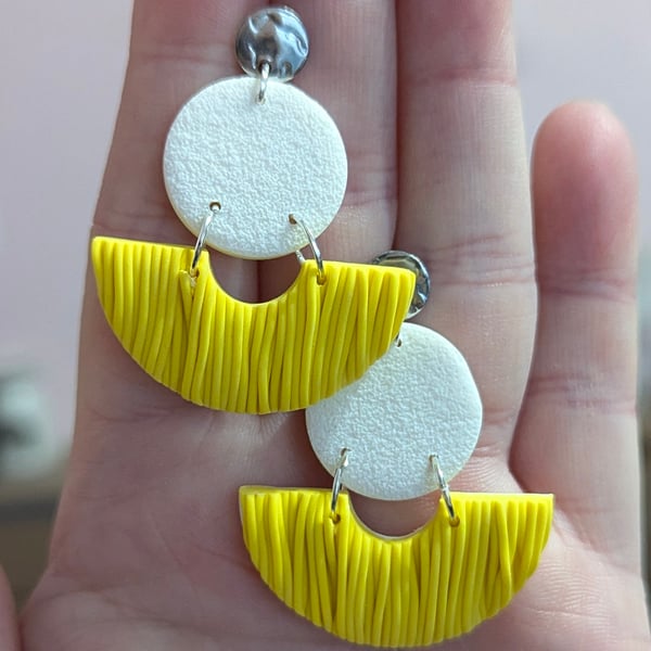 Sprinkles button half circle drop earrings in yellow. 