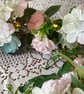 Handmade floral multi coloured, multi flowered garland table decoration. - Image 9