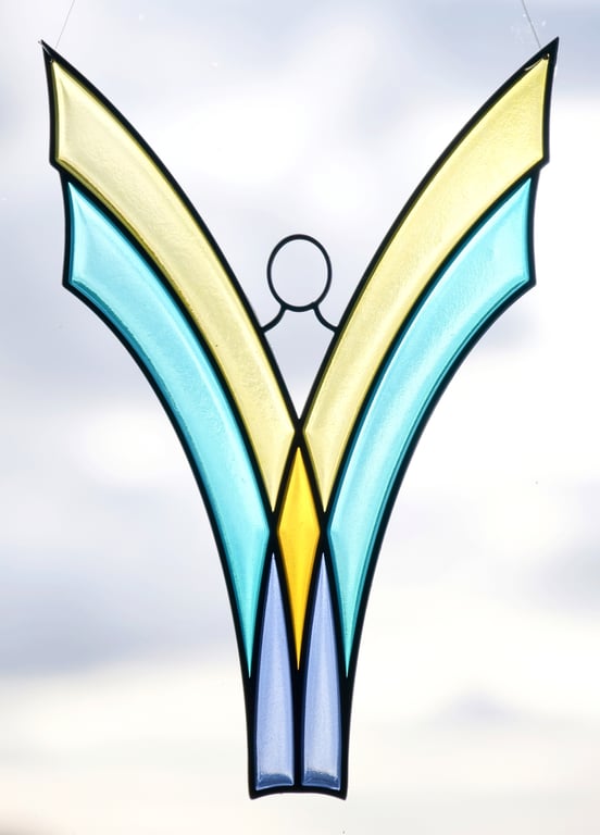 Angel suncatcher - hand made stained glass design in blue tinted resin.