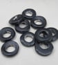 10 Medium Coal Black Glazed Ceramic Donut Beads - Image 1